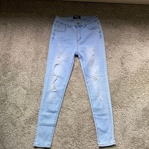 High rise light wash ripped jeans